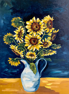 Sunflowers in enamel jug